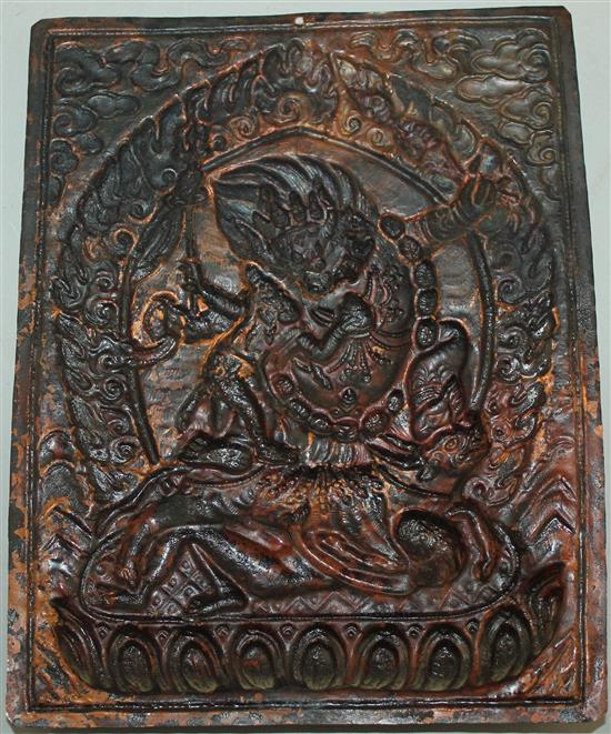 A Tibetan copper plaque of Mahakala and consort, 19th / 20th century, 19.5cm